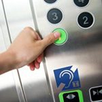 Elevator hearing loop integration